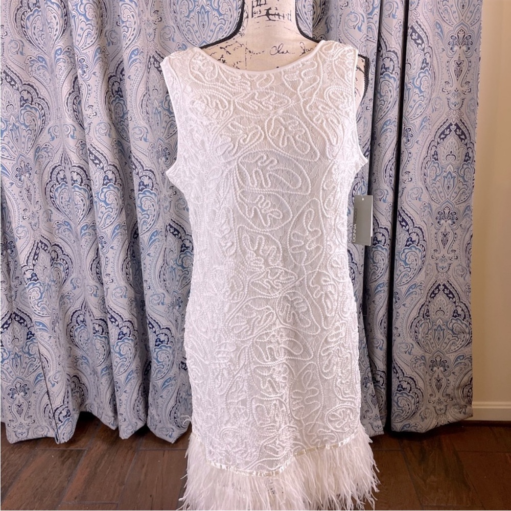 Donna Rico New York White Cocktail Dress with Faux Feather Hemline. Sleeveless.